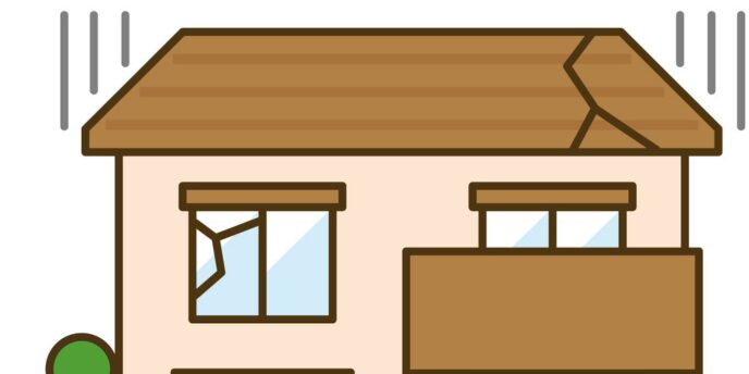 屋根と窓にひびが入った住宅のイラスト。建物が揺れている様子。